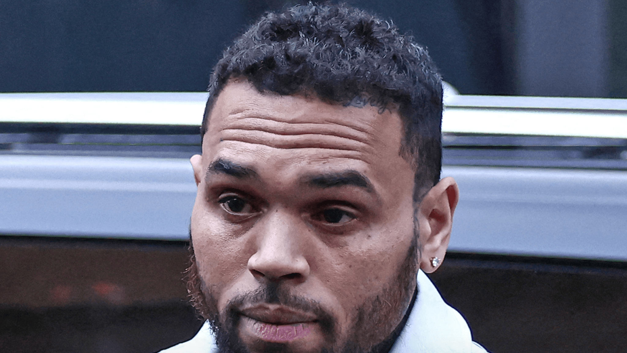 Shots Fired Near Chris Brown’s Tarzana Home: Suspect Arrested, No Involvement from Singer